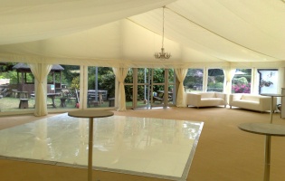 Clearspan Marquees - inside, dancefloor and bar tables